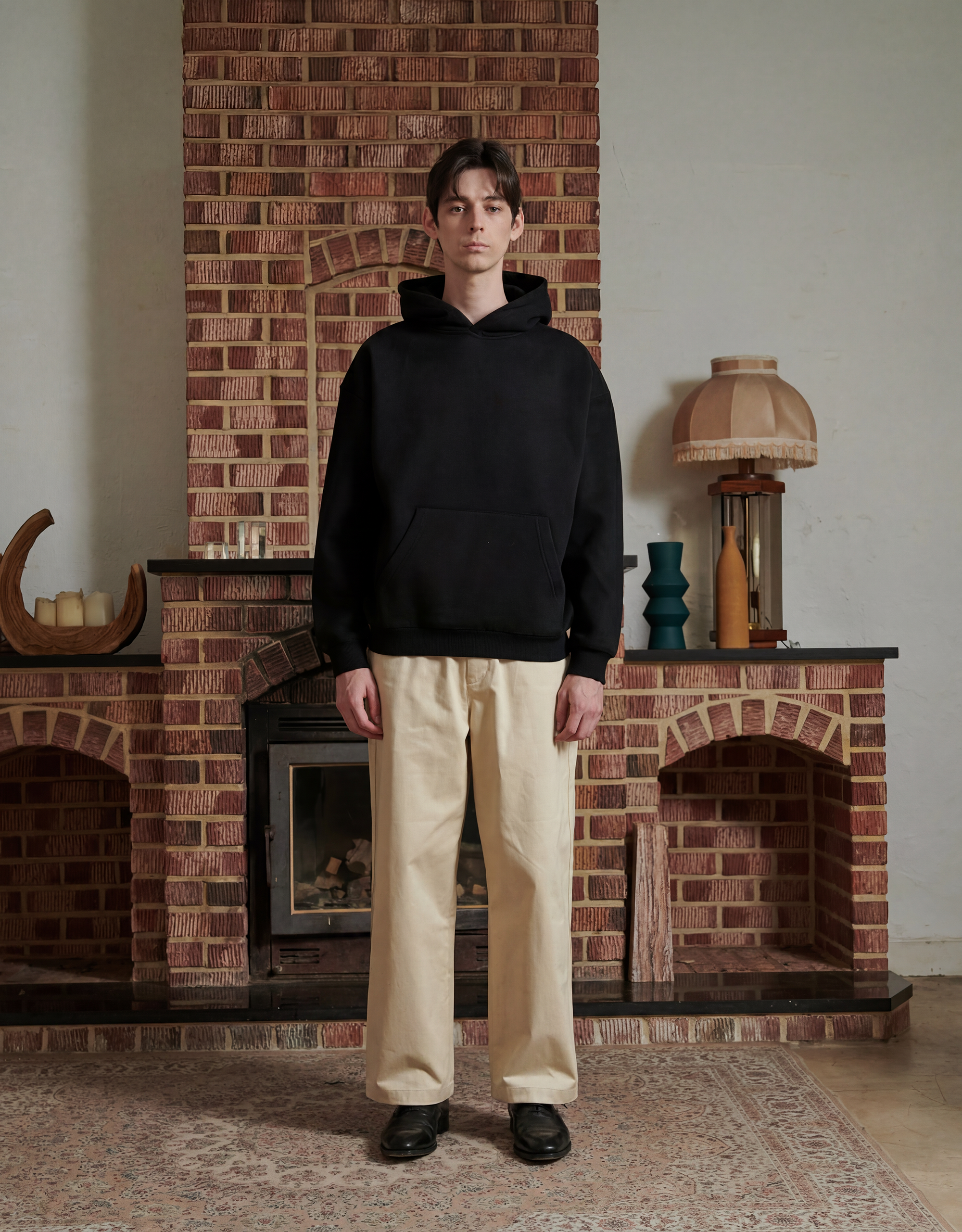 male wearing black hoodie facing forward